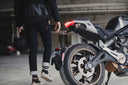 a man wearing jeans that are good for motorcycle riding