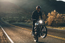 man riding on a motorcycle